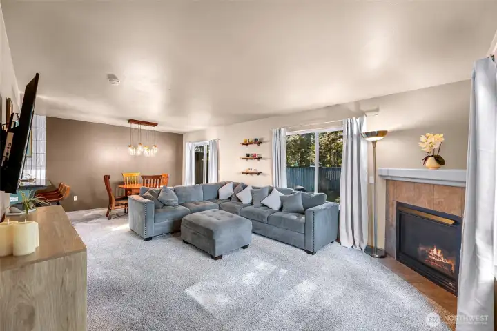 Spacious living area with natural light coming through!
