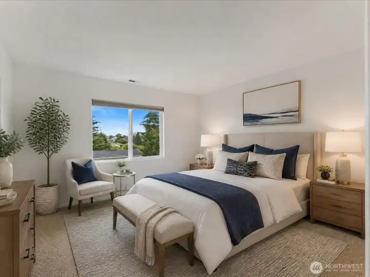 Spacious primary suite featuring a walk-in closet and peaceful views overlooking the expansive backyard and distant mountains. Spacious primary suite featuring a walk-in closet and peaceful views overlooking the expansive backyard and distant mountains.