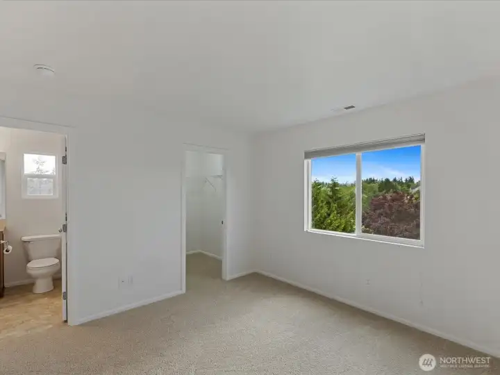 Primary bedroom with walk in closet opens to upper level main full bathroom. Primary bedroom with walk in closet opens to upper level main full bathroom.