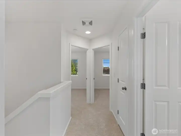 Freshly updated upper level hallway leading to two secondary bedrooms, showcasing new carpeting and pad, fresh paint, and updated trim throughout. Thoughtful upgrades create a bright, clean feel that makes the home feel nearly brand new. Freshly updated upper level hallway leading to two secondary bedrooms, showcasing new carpeting and pad, fresh paint, and updated trim throughout. Thoughtful upgrades create a bright, clean feel that makes the home feel nearly brand new.