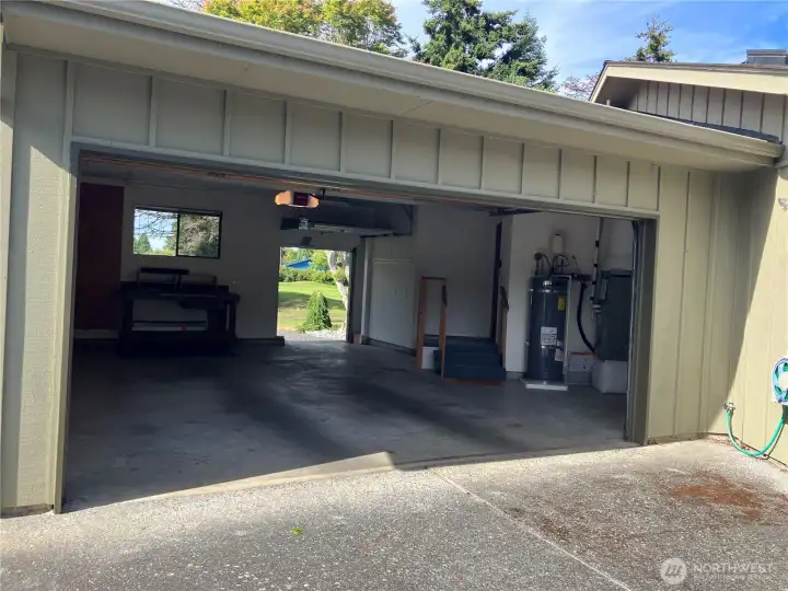 Spacious Two Car Garage w/ Golf Cart Door in the Rear Spacious Two Car Garage w/ Golf Cart Door in the Rear