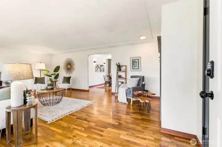 Bright and welcoming, the living room offers an inviting space to relax, entertain, and enjoy everyday living.