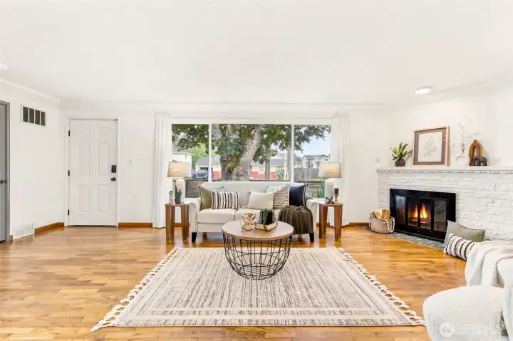 Expansive windows create a bright, airy atmosphere and seamlessly connect the indoors with the outdoors.