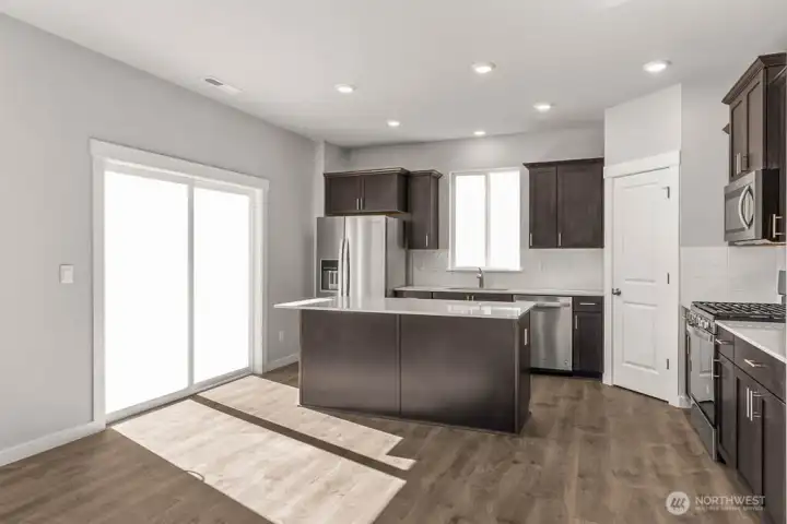 Wonderful kitchen layout. Photos are for representational purposes only. Colors and options may vary.