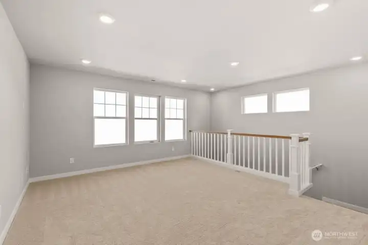Upstairs loft provides a second living area which is perfect for kids, an office, or movie night. Photos are for representational purposes only. Colors and options may vary.