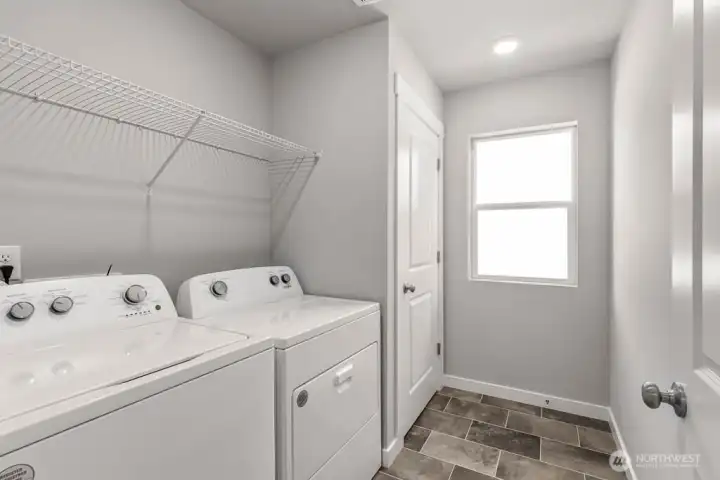 Upstairs utility room. Photos are for representational purposes only. Colors and options may vary.
