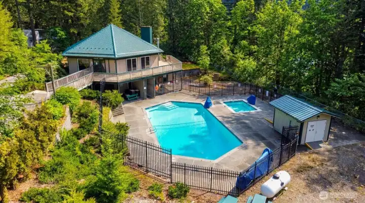 View of one of the multiple clubhouses with  a pool