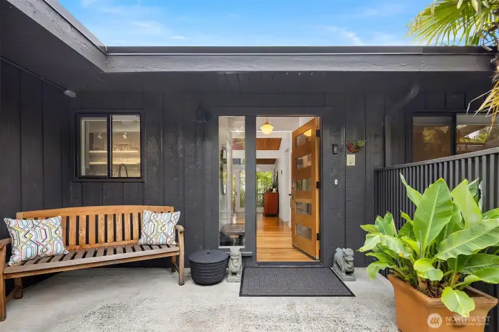 Welcome home to this beautifully restored Mid-Century Modern rambler in the heart of Mercerdale.