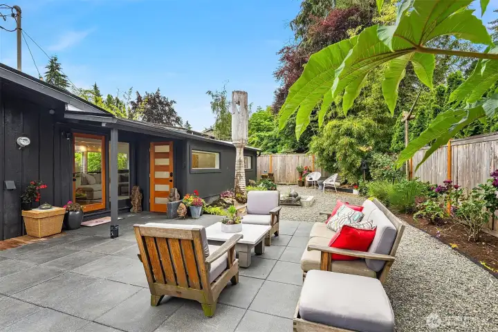 The expansive, re-imagined back patio is ready for your al fresco entertainment.