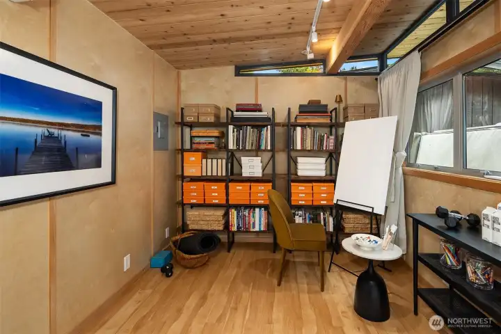Clerestory windows bring in light for working or hobbies.