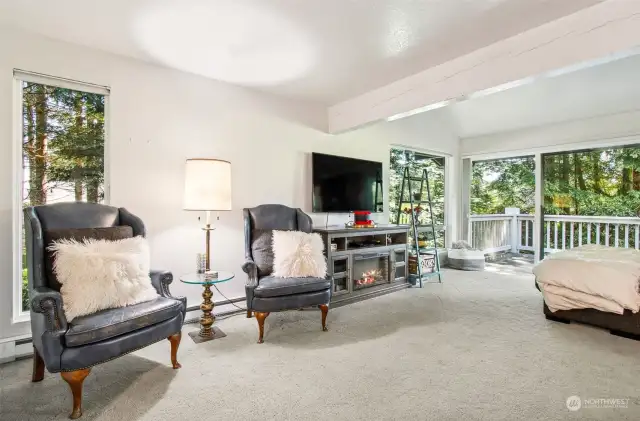 Picture windows let all the wondeful light in this huge living space.