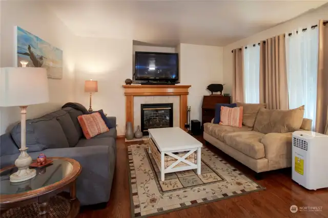 The family room has a charming gas fireplace that efficiently heats the room.