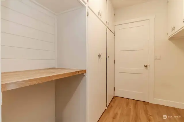 Laundry room/mud room leading to 2 car garage