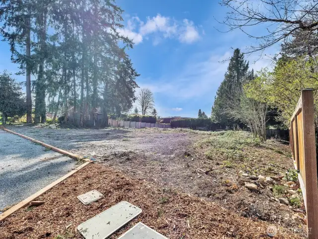 Spacious lot in a peaceful setting facing East off 94th Ave NE.