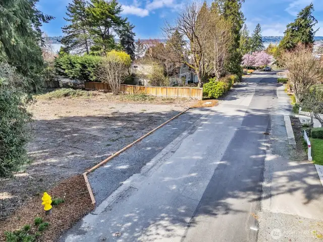 Specious frontal view of lot facing North off 94th Ave NE.