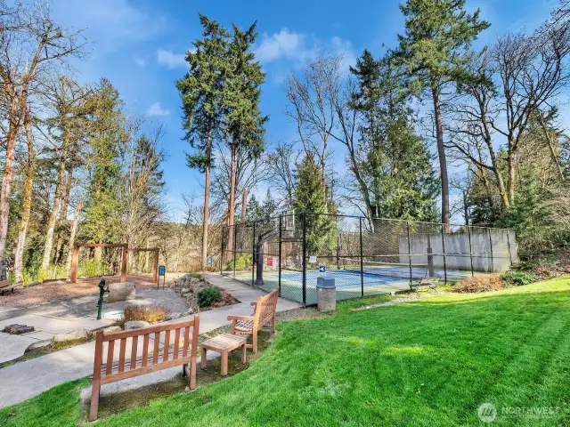 This listing features lush landscaping, a private outdoor space, a community park.