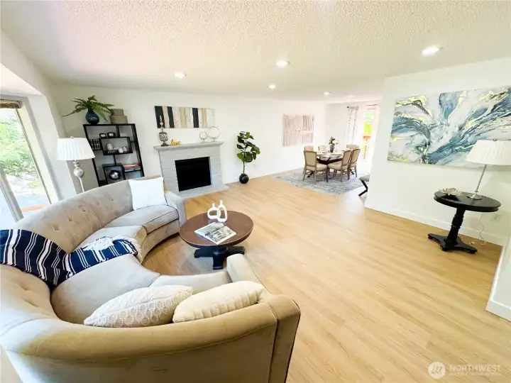 2 of top 5 photos: The living room is expansive and has a wood fireplace.
