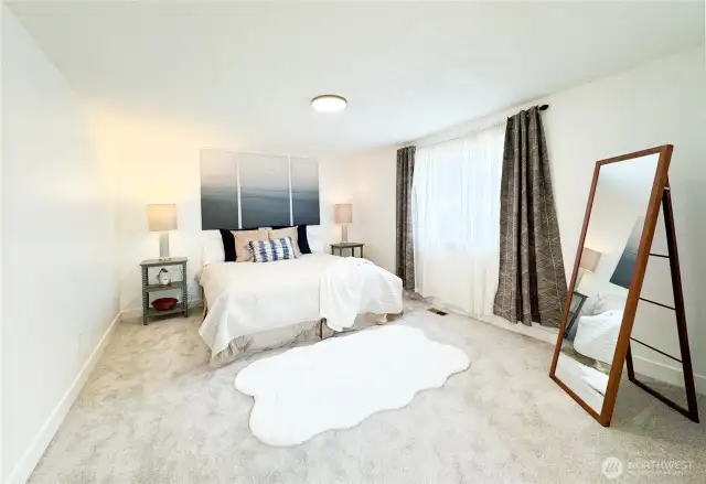 Primary Bedroom is large and has tons of natural light.