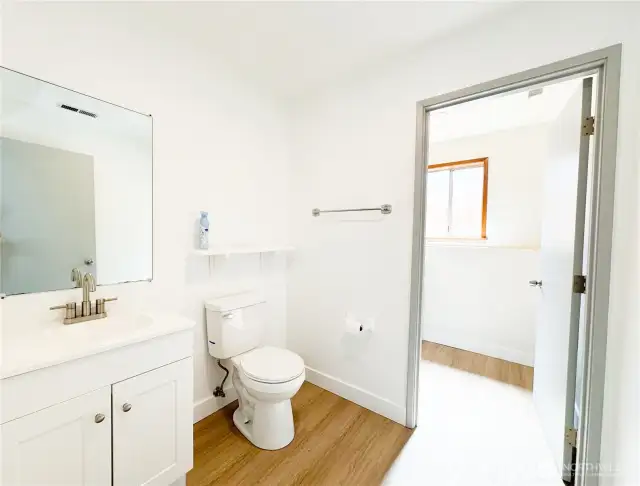Half bathroom has been remodeled. It connects to laundry room and can easily be converted into a full-size bathroom