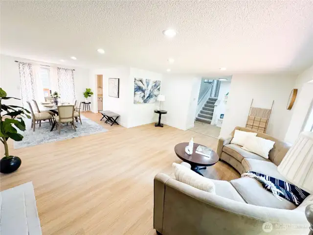 With lots of natural light, open concept set-up and connected kitchen make this great room area a perfect place for your gatherings! Don't miss the new luxury vinyl flooring, fresh paint, and recessed lighting.