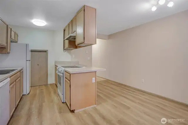 Easy care flooring throughout the kitchen and dining area.