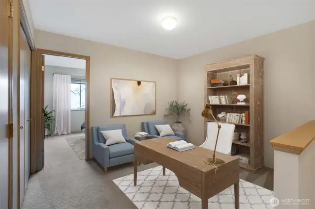 Bonus room at top of stairs can be used for a home office or whatever your needs. This photo has been virtually staged.