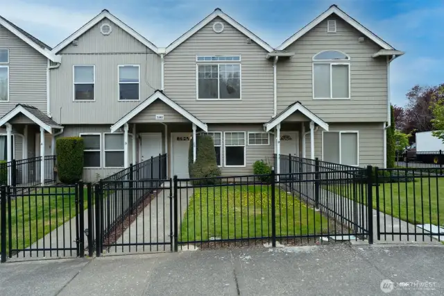 Tastefully gated yard.
