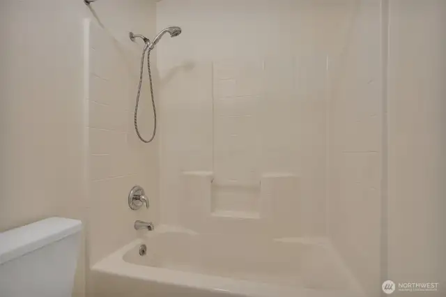 Sparkling clean tub and shower.