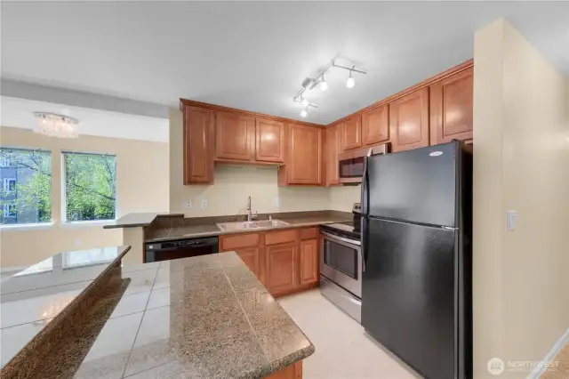 Cherry cabinets, granite countertops