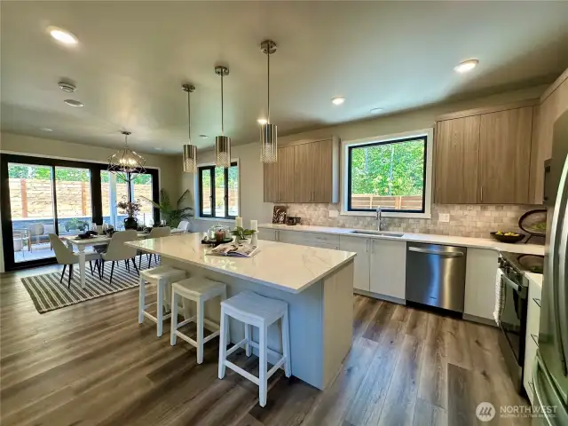 Open kitchen & dining with direct access to outdoor patio