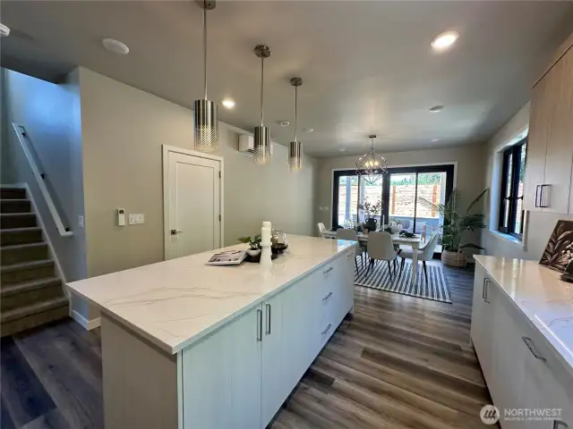 Main floor powder room with motion activated under cab lighting