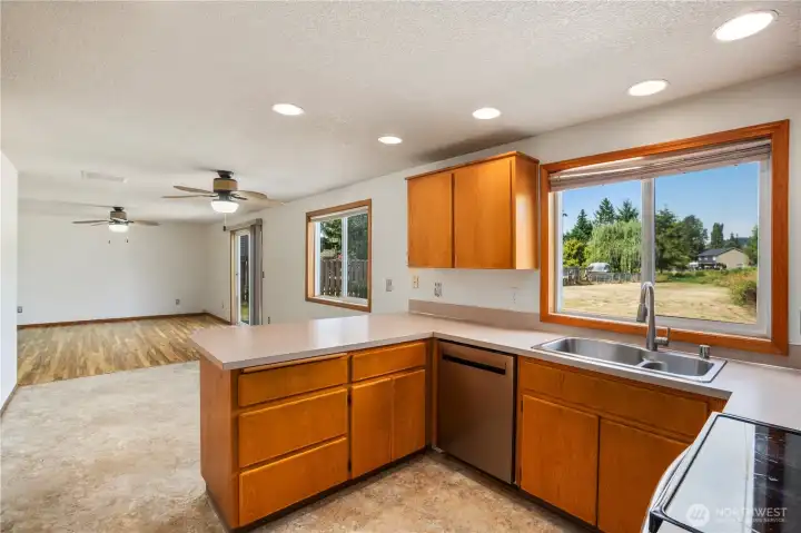 Kitchen opens up to eating nook and family room