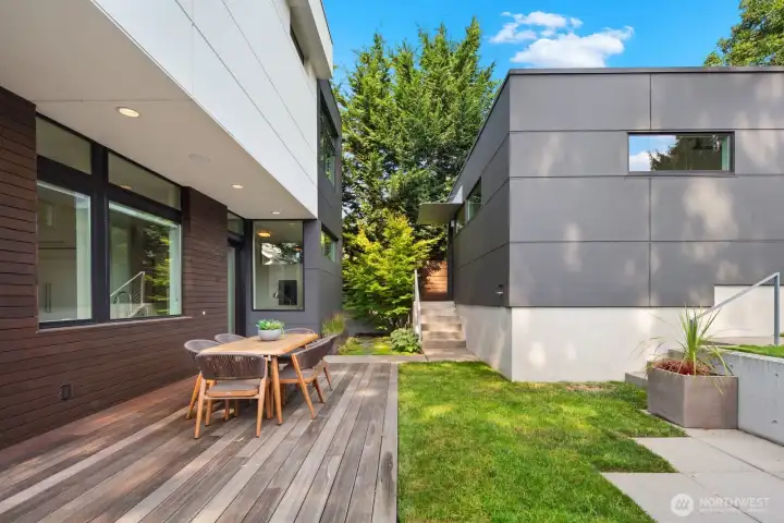 Back yard space, with large entertaining deck built at the same level as the lower yard. Gas stubbed for a BBQ