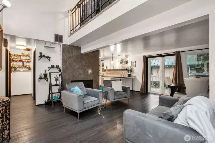 Entering into the home, you will find the livingroom with a gas fireplace, hallway to bedrooms & full bath and a sneak peak of the beautiful kitchen.