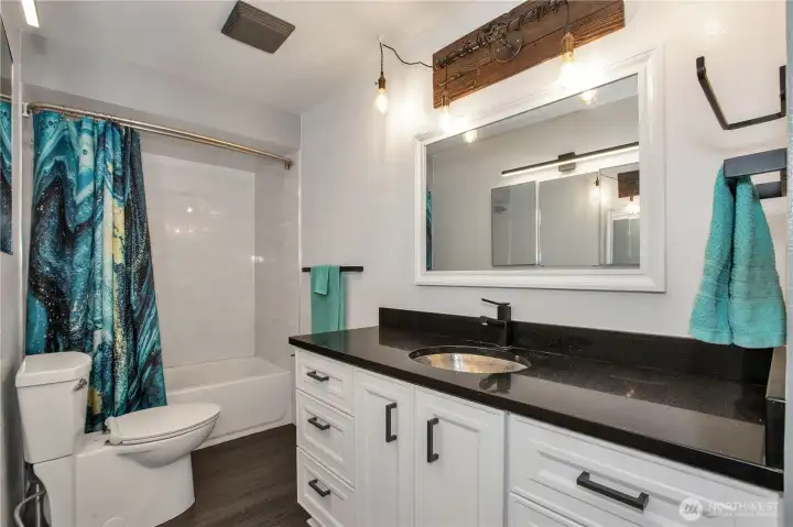 Full Bathroom on main, just across from the two bedrooms