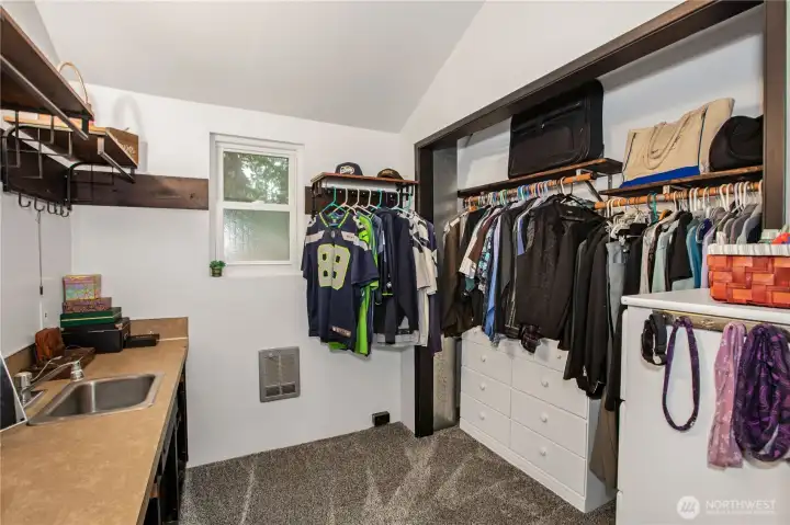 Walk-in closet, has sink and bonus area was previously use as a separate living area with one of the previous owners.