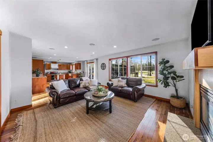 Another view of the main living area emphasizes connection to adjacent spaces and thoughtful layout. Clean lines and updated finishes support everyday living.