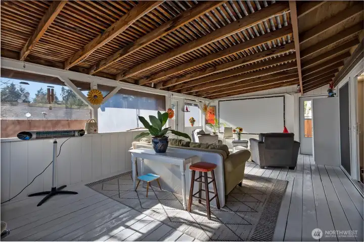 Enclosed deck with 120" screen and cute led lighting