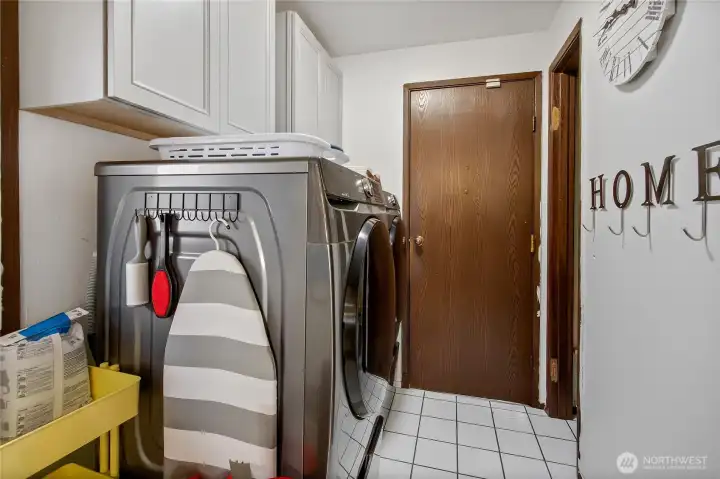 Front loading pedestal washer and dryer staying