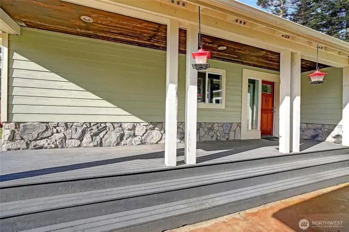 Covered front porch offers year round outdoor entertaining.