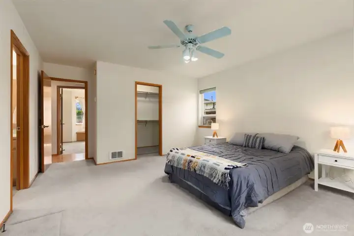 Primary bedroom with walk in closet
