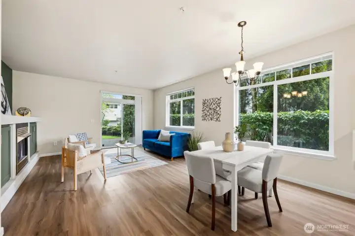 Spacious living area with large windows, abundant natural light, and comfortable everyday living space.