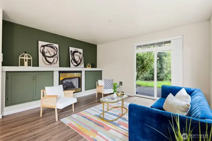 Spacious living room with large windows and abundant natural light.