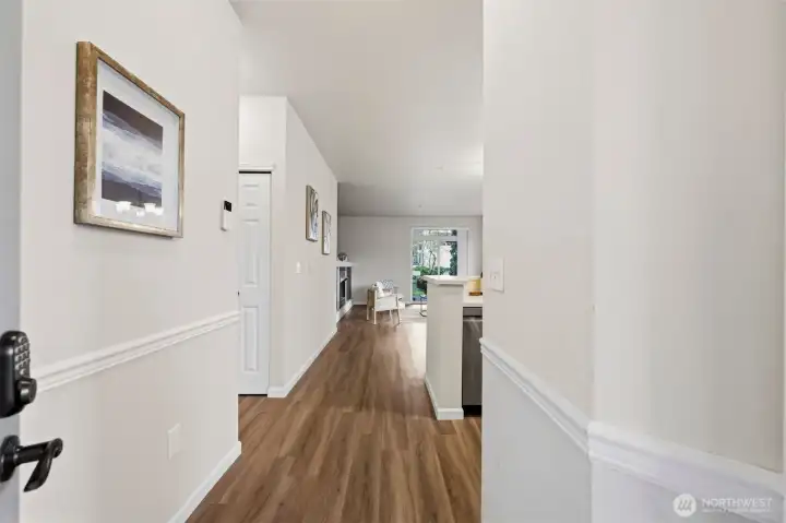 Inviting entry opens to bright single-level layout with updated interior finishes.