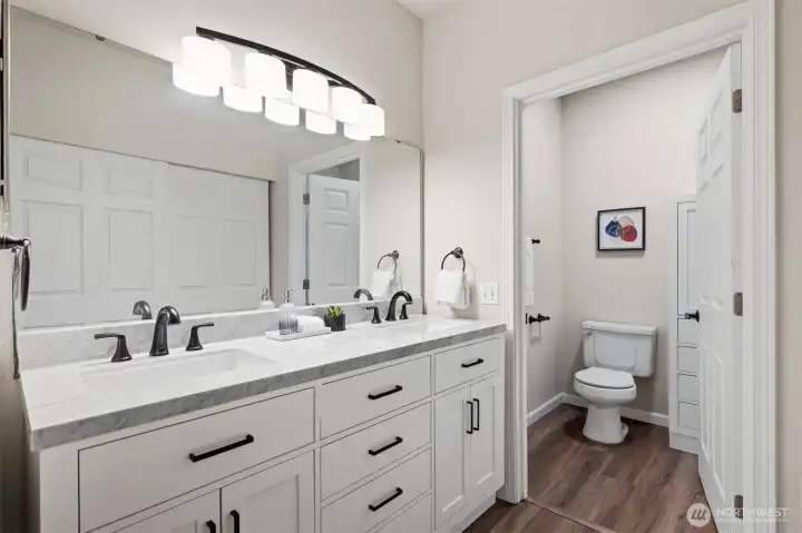 Clean and functional bathroom with well-maintained finishes.