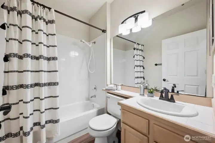 Well-appointed bath space for daily living.