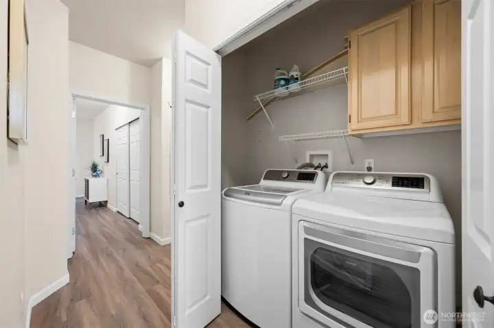 Convenient in-unit laundry area adds everyday functionality.