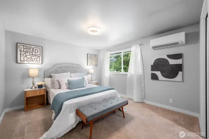 Primary bedroom with natural light and comfortable layout