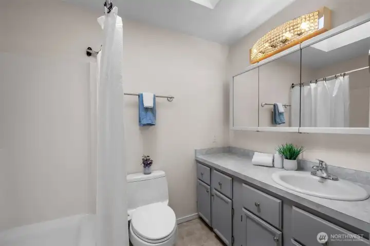 Full bathroom with functional layout