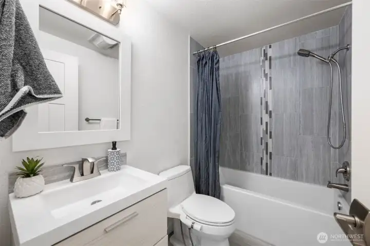 Convenient bath layout serving main living areas